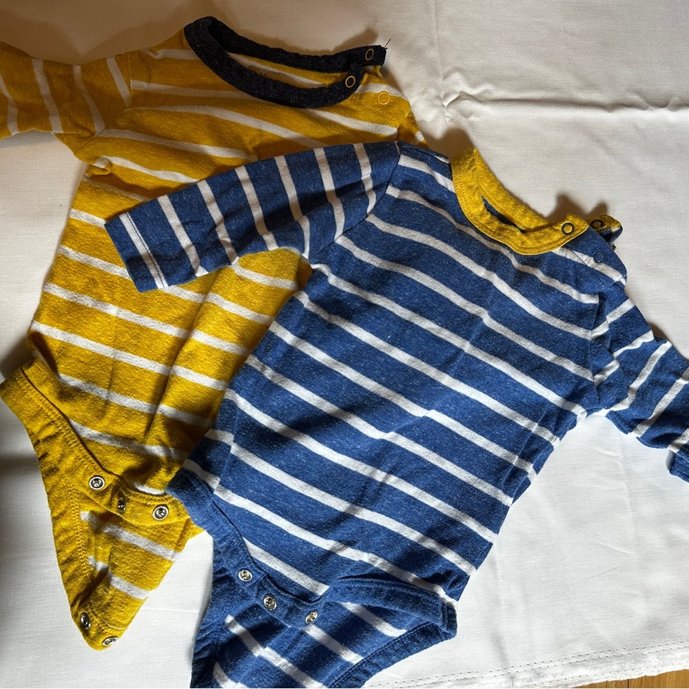 Two 0-3 primary heathered onesies